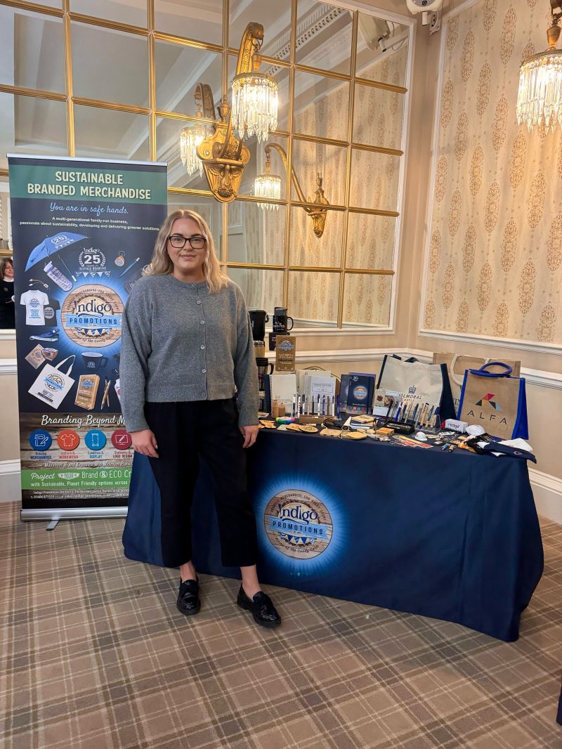 Emily on the road with Indigo merchandise